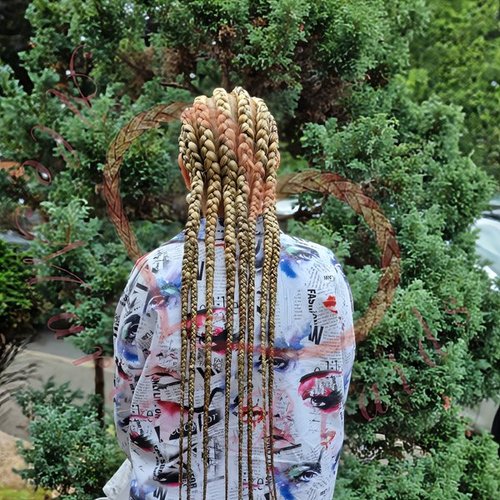 Feed-in pattern braids with knotted loose ponytail hairstyle